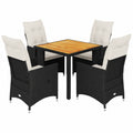 Set da giardino in polyrattan con tavolo in legno di acacia e sedute relax